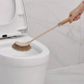 Wooden household handle cleaning toilet brush with curved beige plastic head and natural bristles for effective cleaning