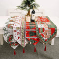 Red and green woven christmas table runner with festive patterns and tassels for a decorative christmas table