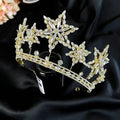 A sparkling gold xingx rhinestone fashion tiara crown with intricate crystal snowflake and leaf designs