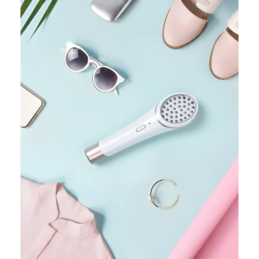 White xpreen wireless blue handheld acne therapy device with circular blue light array and metallic accents