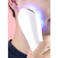 White sleek facial massager with blue LED lights featured in the Xpreen wireless blue light acne therapy device