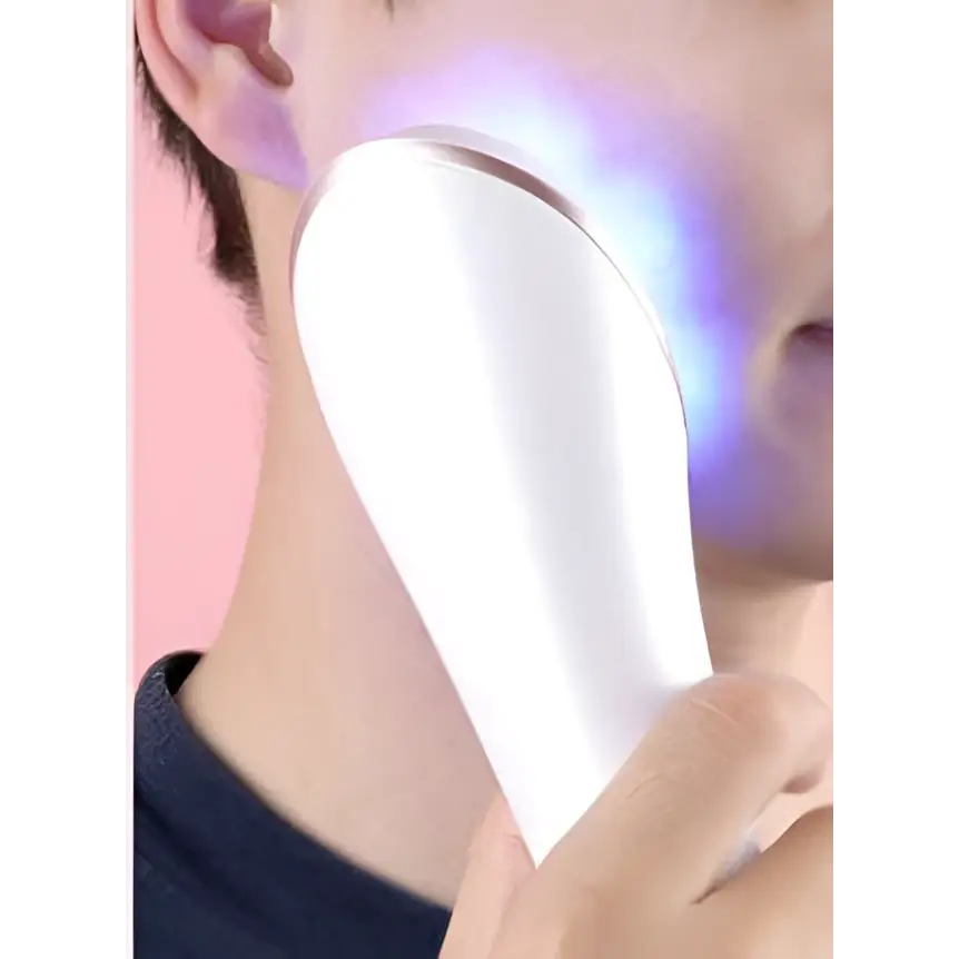 White sleek facial massager with blue LED lights featured in the Xpreen wireless blue light acne therapy device