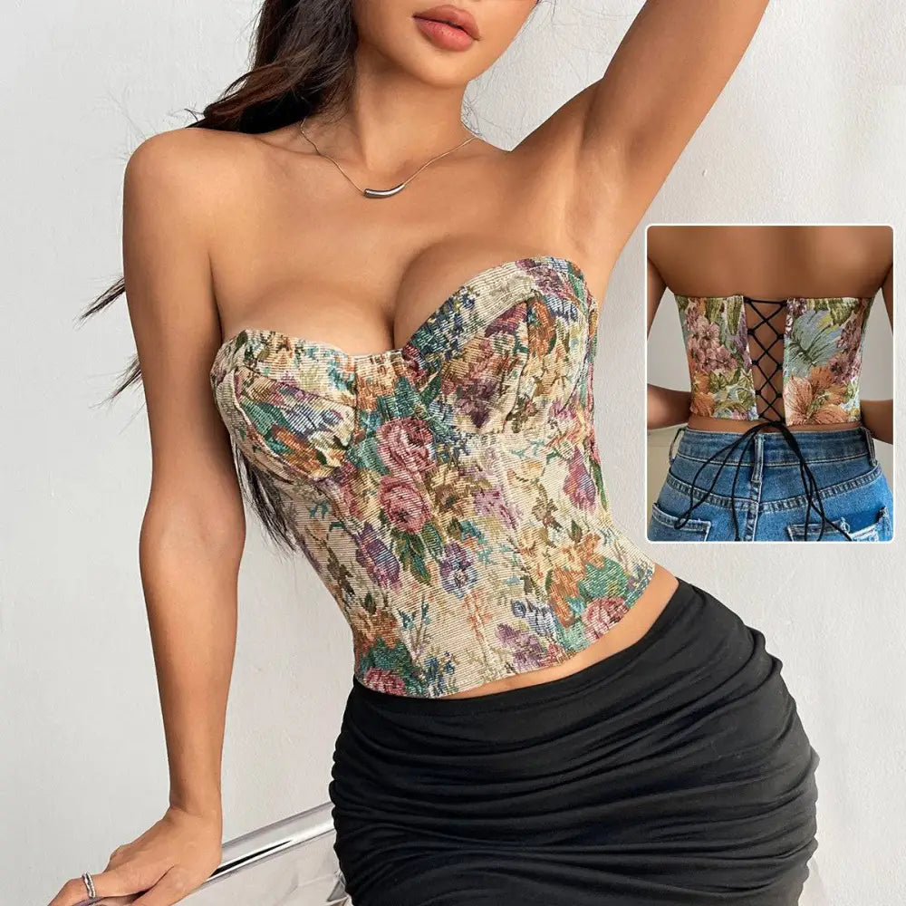 A y2k floral print tube corset top with textured fabric, strapless sweetheart neckline, and lace-up back detail