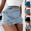 Light-wash denim skorts with layered asymmetrical design and front flap pockets y2k street vintage style