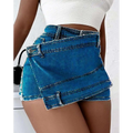 Blue denim mini skirt with layered asymmetrical design and button details in y2k street vintage denim skorts style