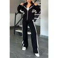 Black and white y2k striped zip jacket casual sportssuit with bold contrast stripes on sleeves zipper and pants legs