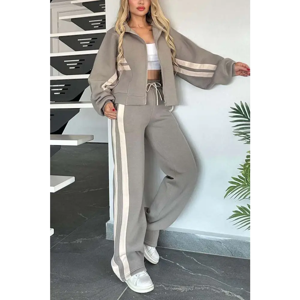 Gray y2k striped zip tracksuit featuring a zip-up jacket casual sportssuit with white stripes on sleeves and legs