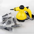 Yellow and black handheld steam cleaner with flexible nozzle and coiled power cord ideal for luxury women’s fashion care