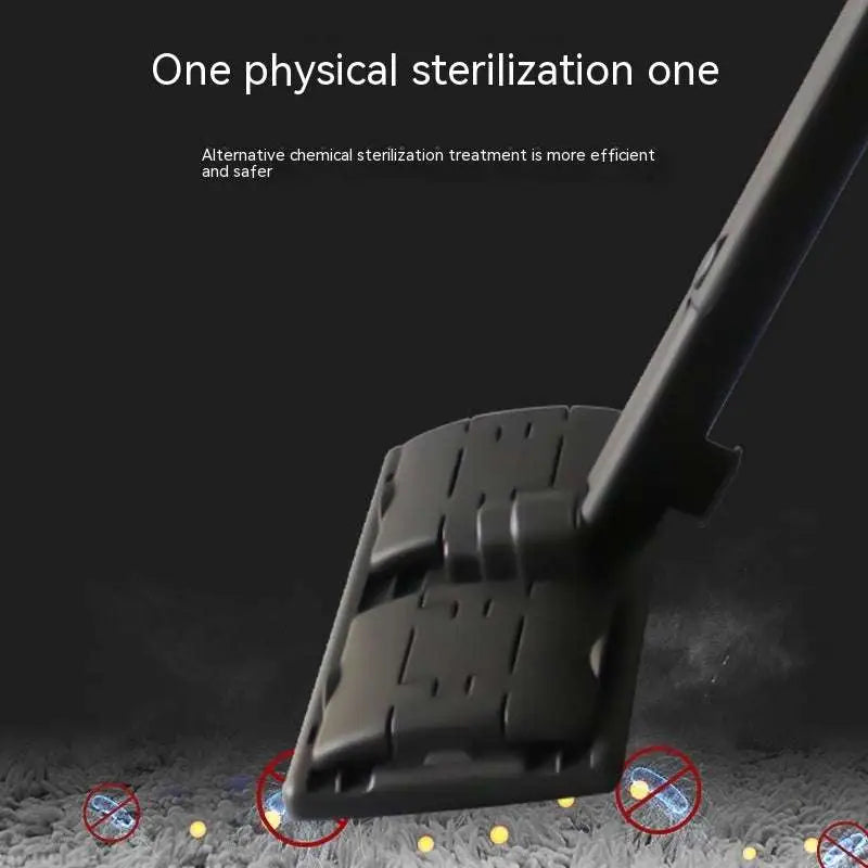 Black plastic floor mop head with textured ridged surface designed for effective cleaning and black kitchen appliances use