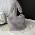 Soft light gray plush bucket bag with fluffy handle and pearl chain design inspired by yellow checkerboard style