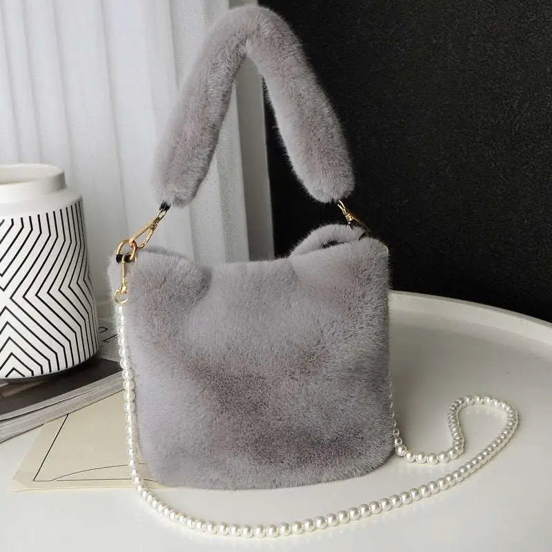 Soft light gray plush bucket bag with fluffy handle and pearl chain design inspired by yellow checkerboard style