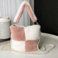 Soft pastel pink and white checkered plush bucket bag with bunny ear handles and pearl chain design strap