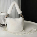 White faux fur handbag with fluffy handle and pearl chain design resembling a yellow checkerboard plush bucket bag