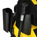 Black and yellow hydraulic hose connector with metallic thread on retractable hose of yellow high pressure cleaning machine