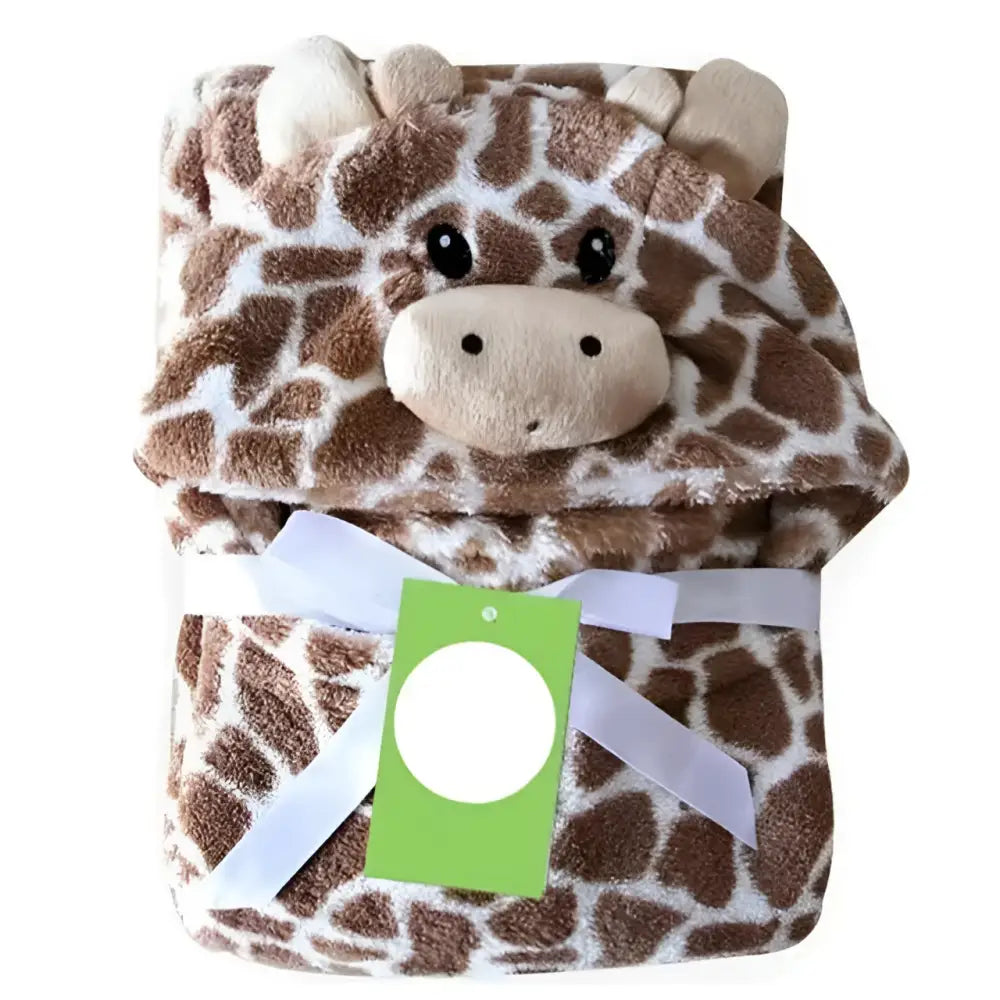 A plush brown and cream giraffe animal baby towel with soft textured fabric for use as a baby towel blanket