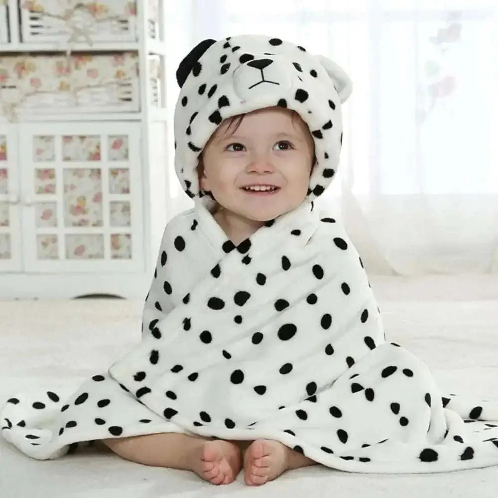 Yellow plush lion animal baby towel blanket with orange mane and white facial accents made of soft plush material