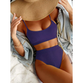 Purple ribbed two-piece swimsuit with thin straps and high-waisted bottoms featuring a high waist bikini design
