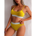 Yellow ribbed high waist bikini swimwear with white horizontal bands in a bright yellow ribbed two-piece swimsuit