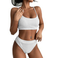 White textured ribbed two-piece swimsuit with thin straps and high waist bikini bottoms for stylish swimwear use