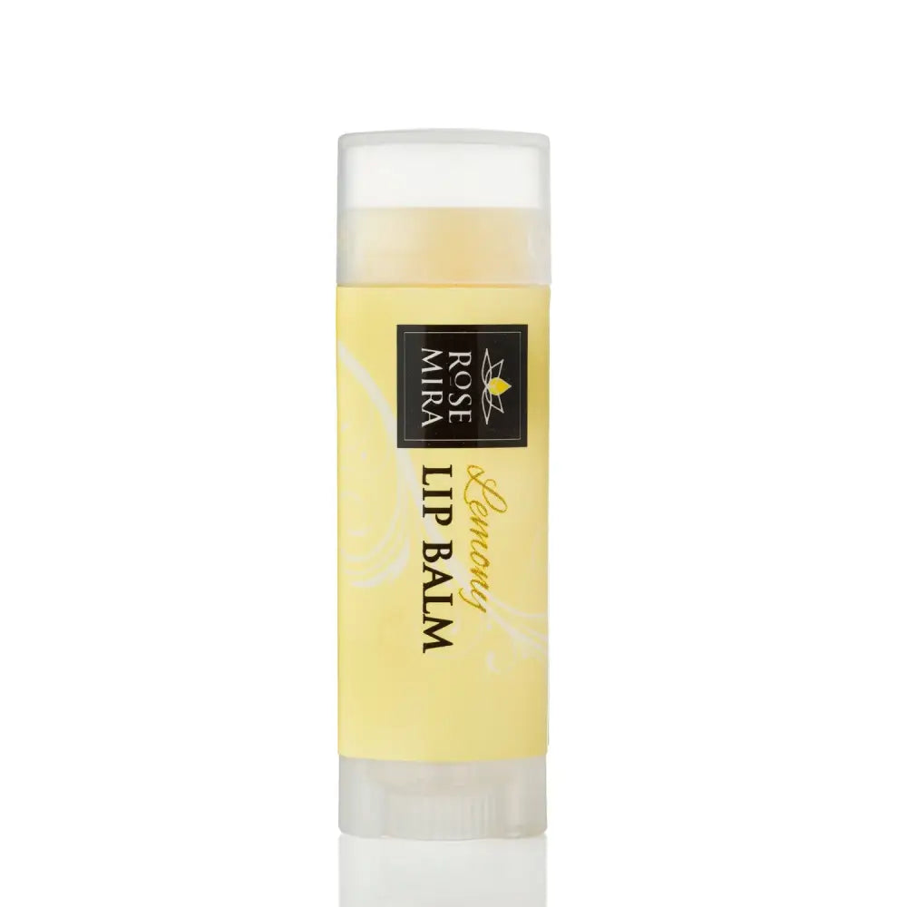 Yellow rose lemony lip balm in a clear plastic tube with black label for moisturizing rose lemony lips