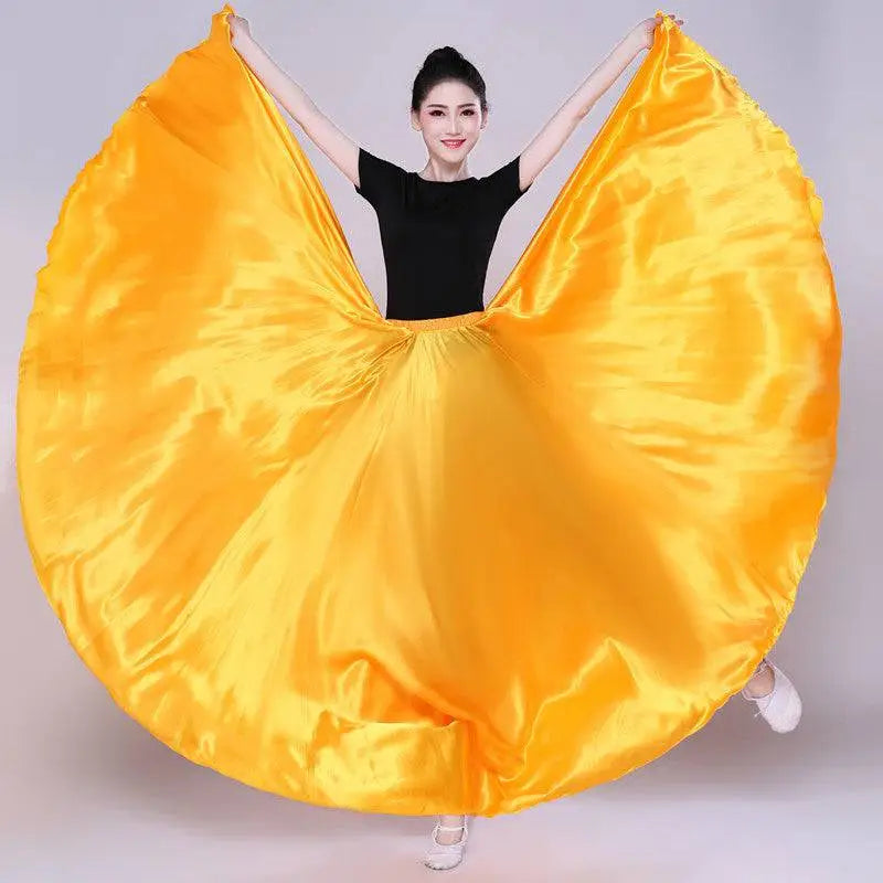 Vibrant yellow satin solid color dance skirt with flowing circular design ideal for color performance skirt use
