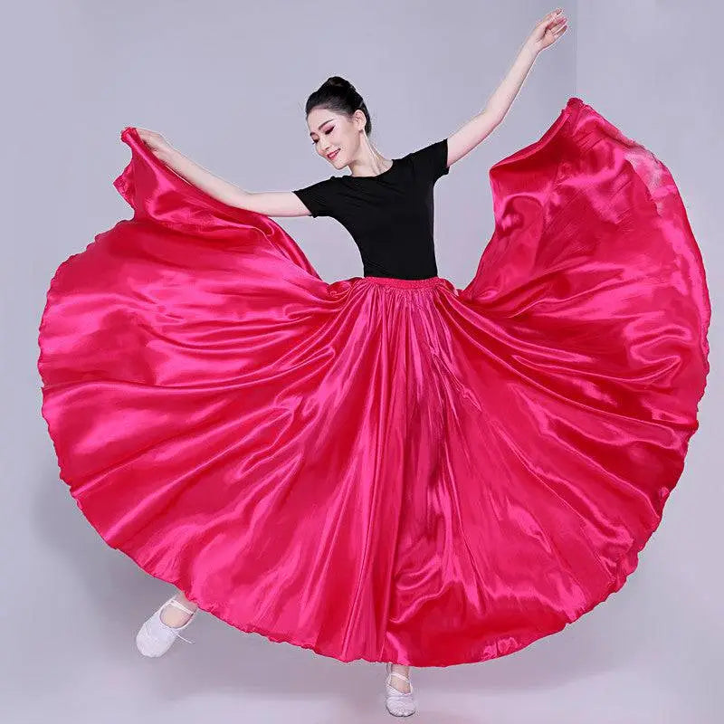 Vibrant fuchsia satin solid color dance skirt with a flowing full silhouette for color performance skirt use