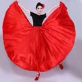 Vibrant red satin solid color dance skirt with flowing wide hem paired with fitted black top for color performance skirt