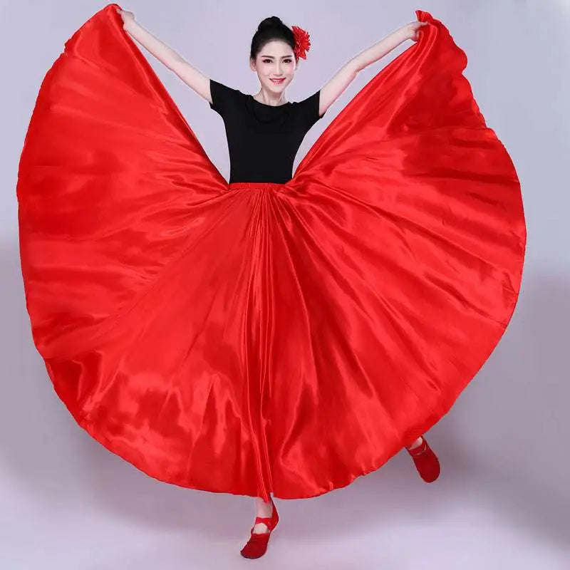 Vibrant red satin solid color dance skirt with flowing wide hem paired with fitted black top for color performance skirt