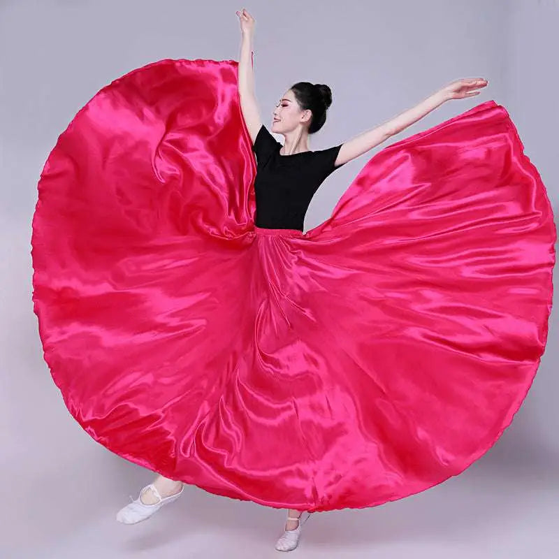 A vibrant fuchsia satin solid color dance skirt with a flowing circular design for color performance skirt use