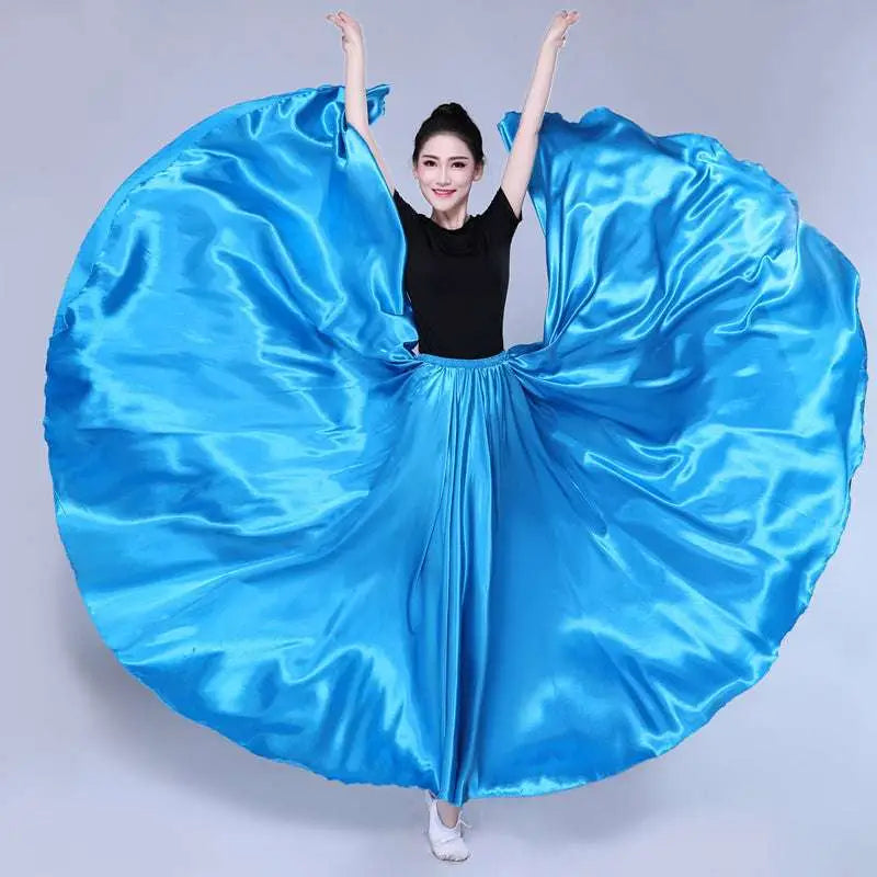 A vibrant blue satin solid color dance skirt with a fitted waistband and flowing wide hem for color performance skirt use