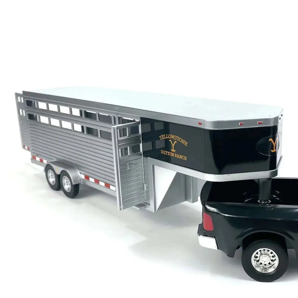 Black and silver Yellowstone dutton ranch horse trailer model with detailed slatted sides and gold lettering for amt adult collectibles