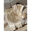 Cream satin sleeveless top with v-neck and front bow detail in youthful fashionable champagne western style clothing
