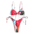Zaful womens high cut thong bikini set with vibrant abstract reds blues and greens thin straps and tie-side detailing