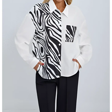 A stylish zebra ladies collar print button chest pocket shirt in white and black with long sleeves and button-down front