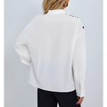 White satin zebra ladies collar chest pocket shirt with black geometric shoulder accents and collar print button details