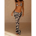 Zebra printed bikini two-piece set with halter top and matching flared printed bikini strappy skirt casual pants