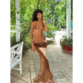 A flowing leopard-print maxi strappy skirt with a high slit and frayed hem for a zebra printed bikini casual suit