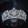 A sparkling silver zircon bride crown with ornate floral and scrollwork designs for crown fashion headwear