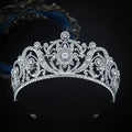 Ornate silver zircon bride crown featuring intricate floral filigree and central diamond for crown fashion headwear
