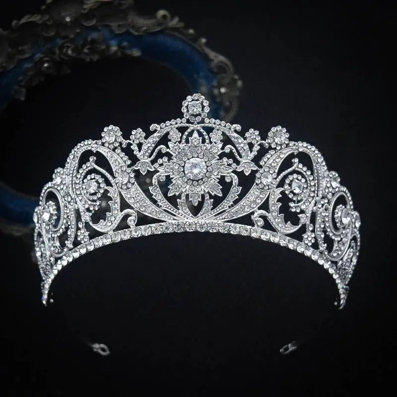 Ornate silver zircon bride crown featuring intricate floral filigree and central diamond for crown fashion headwear