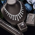 A sparkling zircon necklace earrings bracelet ring set with floral and rectangular design on black velvet bust