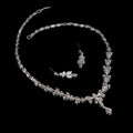 Silver leaf-patterned zircon simple bridal set featuring sparkling crystal accents and matching leaf crystal earrings