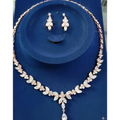Rose gold leaf crystal necklace with sparkling zircons and teardrop pendant from simple bridal set with leaf crystal earrings